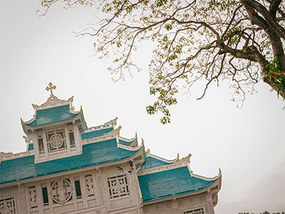 Roof of a blue temple in Hue, Vietnam